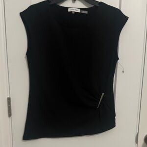 Never worn!
Calvin Klein Black Women's Blouse with Pin Detail